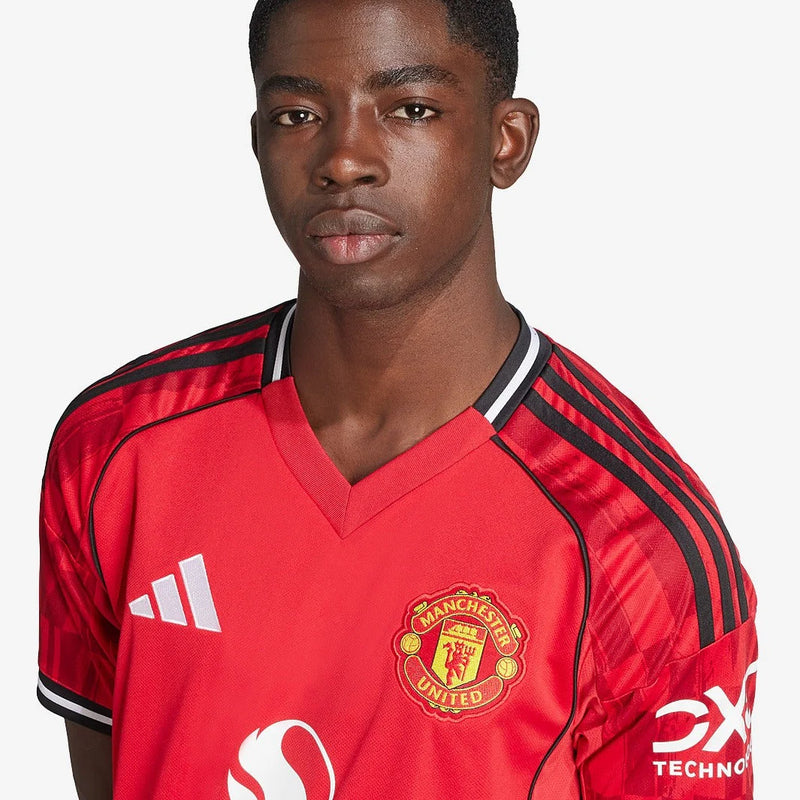 CAMISA ADIDAS MANCHESTER UNITED I 2025/26 TORCEDOR